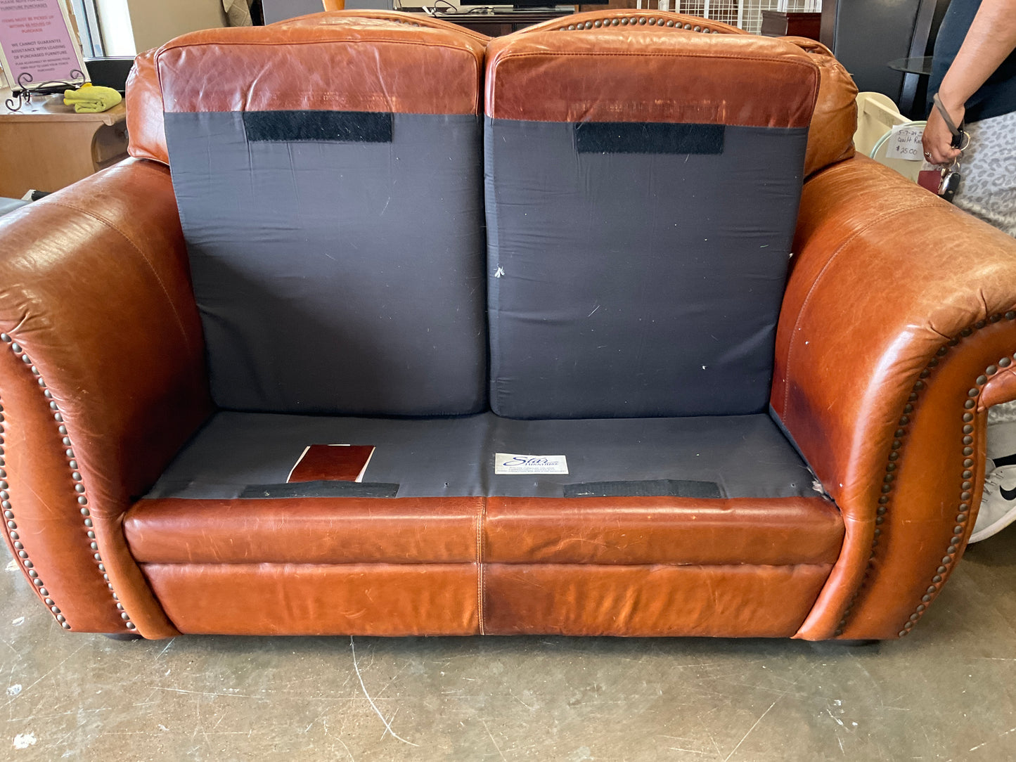 Leather Loveseat **AT OUR 1ST STREET LOCATION**