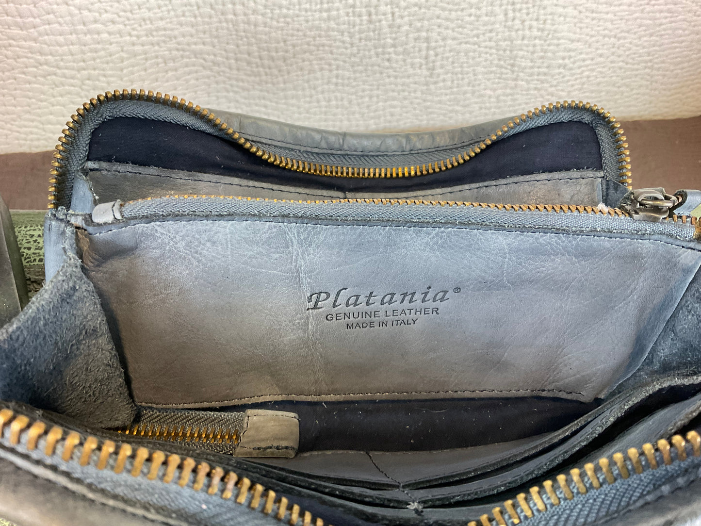 Platania Studded Distressed Leather Wristlet